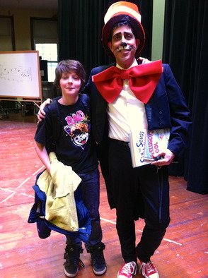 Seth Boyden Principal, Mark Quiles, as the Cat in the Hat with 5th grader Ethan Mann.