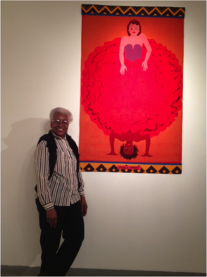 Nettie Thomas, Curator of the 1978 Maplewood Arts Center, standing alongside Emma Amos’ famous painting “Curly Topsy”.