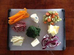 prepping ingredients to roll in a chicken cutlet