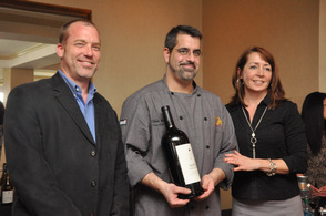 Executive chef Chris Masey of Nicole's Ten is presented with a Napa Cellars Wine by Joe Shirley, and Deborah Smith of JerseyBites.com.