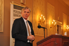 Robert B. Nicholson, III, president of the chamber board, addresses the group.