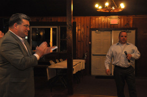 Senator Steve Oroho applauds as Sheriff Mike Strada takes the microphone.