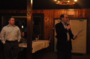 Glen Vetrano welcomes the guests, while Sheriff Mike Strada looks on. 