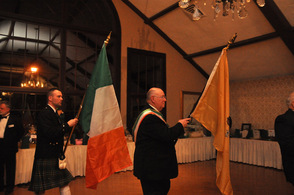 The procession of flag bearers, with the United States, New Jersey, and Irish Flags.