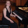 Small_thumb_d67447ce97cddf38cc2b_luba_at_piano