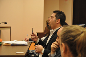 Nick Campanella of Fincredit Inc., shows the town council the card.