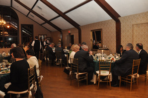 Guests mingle at the dinner on Saturday night.