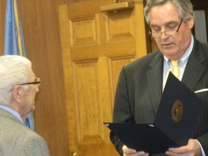 Edward Borneman receiving a community serivce award