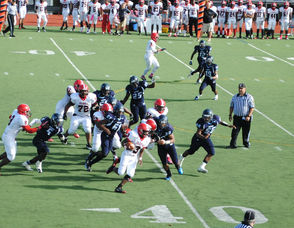 Columbia running back Kenneth Antwi breaking a tackle on a rush