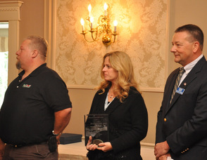 Jay and Jill Fischer of Ag Choice, with John Drake.
