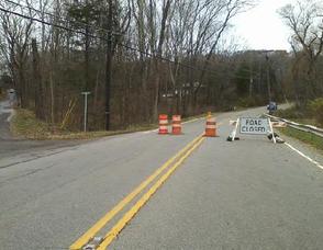 At County Road 610 heading to Stillwater, at Fredon-Marksboro Road, vehicles proceed past the "Road Closed" sign.