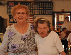 Ruth Beckman, and Pat Tkaczyk dance to a polka tune.