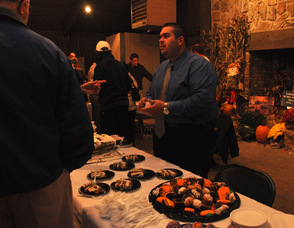 Carlos Luaces serving dessert.