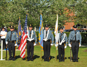 Local police standing at attention.