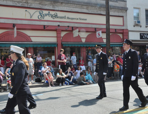 Andover Borough Fire Department marches in front of the Spring Board Shoppes.