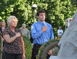Kevin Pettenger, and Nicki Dobias with their hands over their hearts.