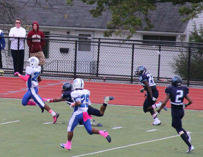 #1 Irvin Paye running hard late in the fourth quarter and would eventually score.
