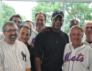 Darryl Strawberry with Nielsen Dodge Chrysler Jeep Ram employees.