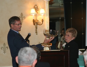 Charles Weidman presenting Linda Maggio with a gift on behalf of the WUF