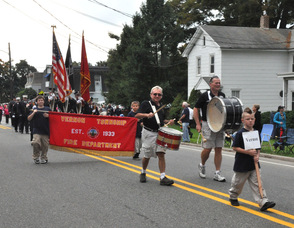 Vernon Township Fire Department marches on Main Street.