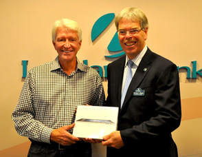 Dr. Henry Long, one of the iPad winners, poses with Thomas J. Shara, Lakeland's President and CEO. 