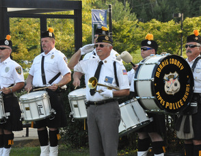 "Taps" with Bob Caggiano, and the Police Pipes and Drums of Morris County.