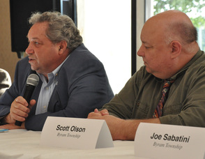 Carl Lazzaro (left) from Fredon speaks as Scott Olson (right) looks on.
