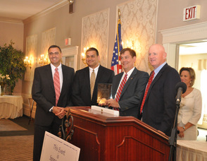 CP Engineers Ray Roggero, Joe Toscano, and Stan Puszcz, receive the Business Investment Award.