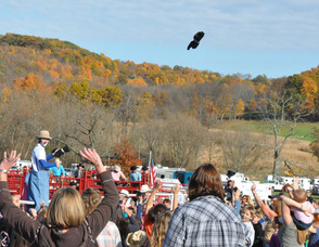 A t-shirt flies through the air, as one of the prizes for the crowd.