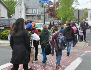 The Walking School Bus crosses Sparta Avenue to Merriam Avenue.
