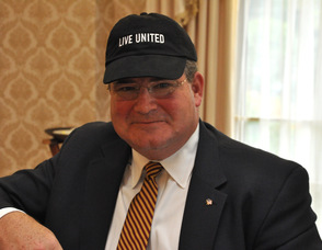 Senator Steven Oroho sports a "Live United" hat.
