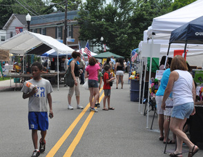 Attendees mingle on Stanhope's Main Street at the Spring Festival & Car Show.