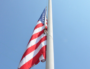 The flag flies at half-mast.