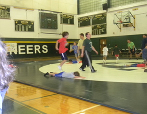 kids practicing wrestling moves