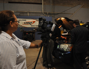 Zaida Collazo, camerawoman for "Today in America," films the team at Extreme Energy Solutions.