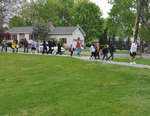 The "bus" walking along Gardner Avenue.