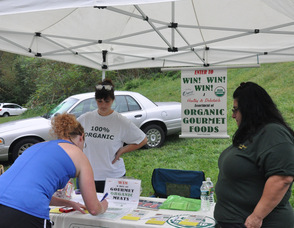A participant enters to win an organic food giveaway.