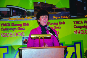 During the 2013 YMCA Strong Kids Campaign Kick Off, Sussex County YMCA Campaign Chairperson Lisa Pompey Smith announces the Sussex County YMCAs branch goal of $205,000.
