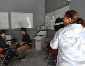 Zaida Collazo films Samuel K. Burlum, and Brian Thomas.