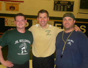 Adam Smith with two of his coaches