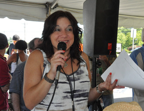 Maria Lake, 102.3 WSUS radio personality emceeing the Daisy Duke look-a-like contest.