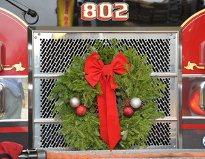 The front of Engine 802, adorned with a wreath.