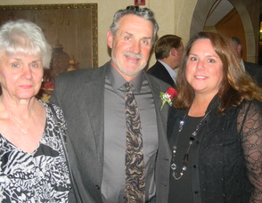 Kevin Carroll with his mother and wife