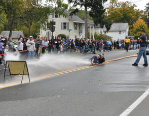 Hose laying following the parade.