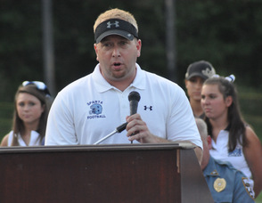 Josh Hertzberg at the podium.