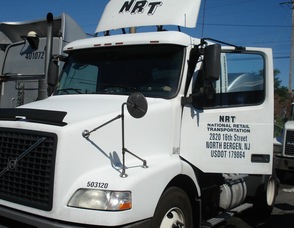NRT from N. Bergen, NJ (picture of white truck with NRT on the door), caption -   NRT is just one of many NJ trucking companies forced to adopt equipment that hurts the performance of the truck's output.  This truck actually was retrofitted with a SMART Emissions Reducer, and became compliant for far less cost than equipment listed on the EPA Verified Technologies List. .