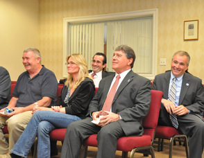 Assemblyman Gary Chiusano, and Commissioner of the State Department of Labor and Workforce Development, Harold J. Wirths, among the audience.