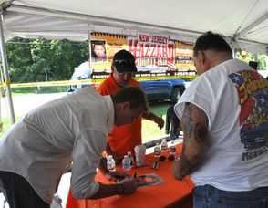 John Schneider signs for fans at Franklin Sussex Auto Mall at the outdoor event.