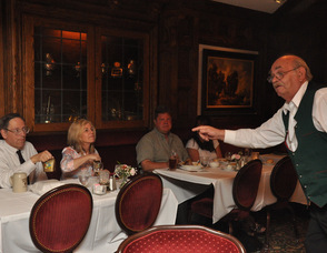 Werner Goebel cues guests to ring their cowbells.