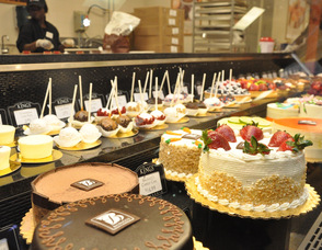 An array of baked goods, including Balducci's cakes.
